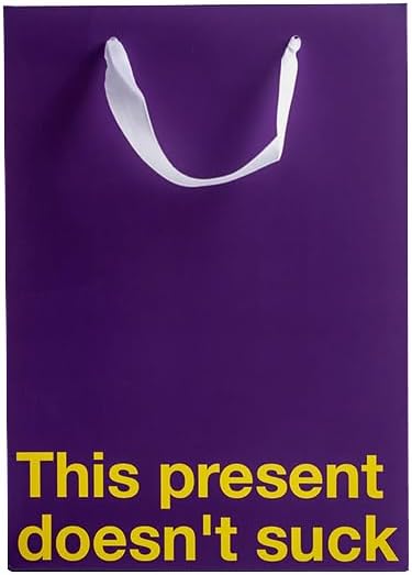 Purple gift bag with the phrase 'This present doesn't suck,' a perfect choice for a funny gift bag.