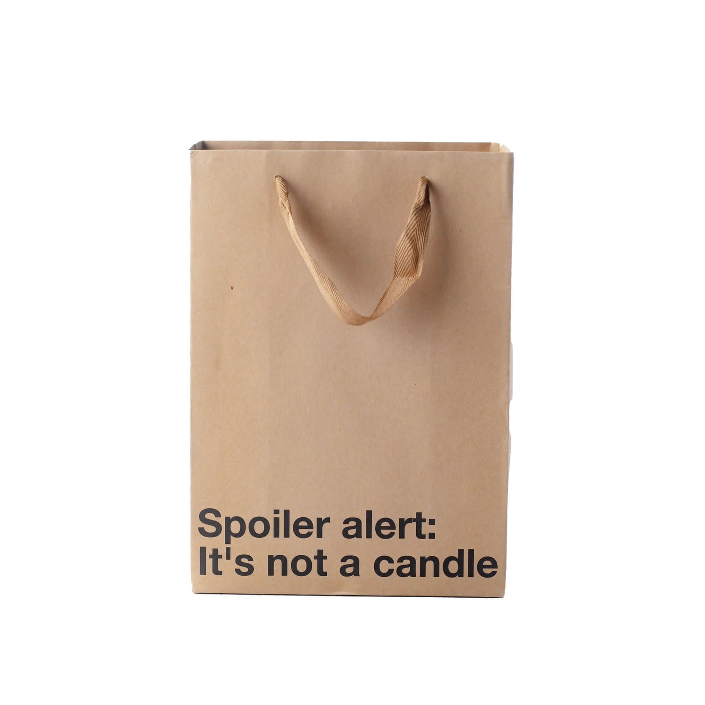 Funny gift bag with the text 'Spoiler alert: It's not a candle' on a kraft material with brown ribbon handle.