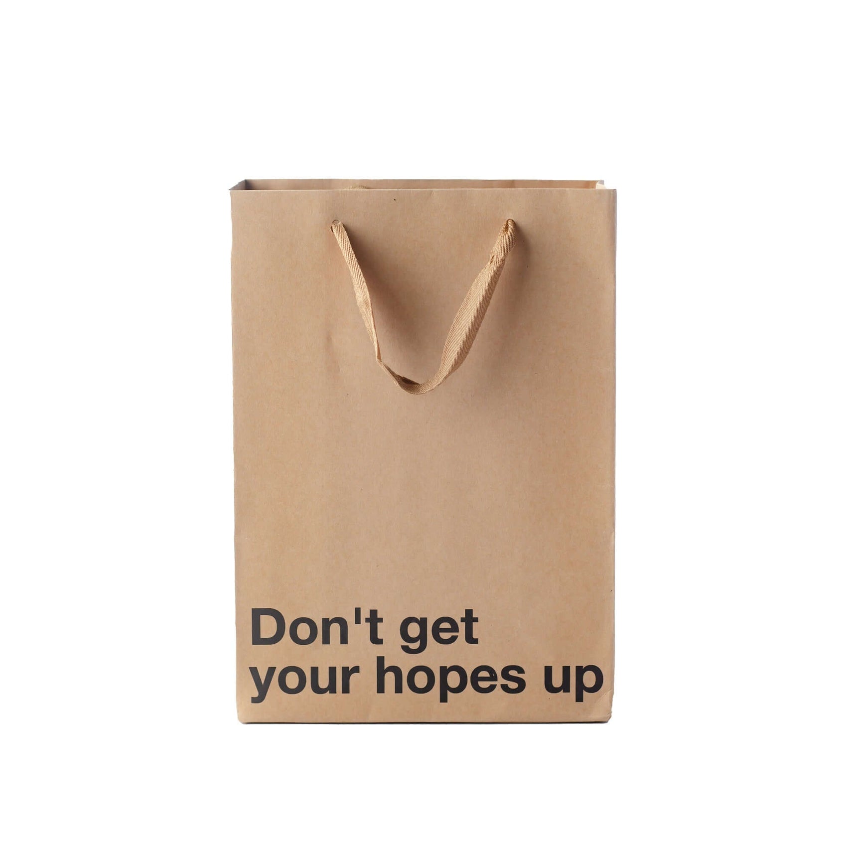 Funny gift bag with the text 'Don't get your hopes up,' made of kraft material with brown ribbon handles.