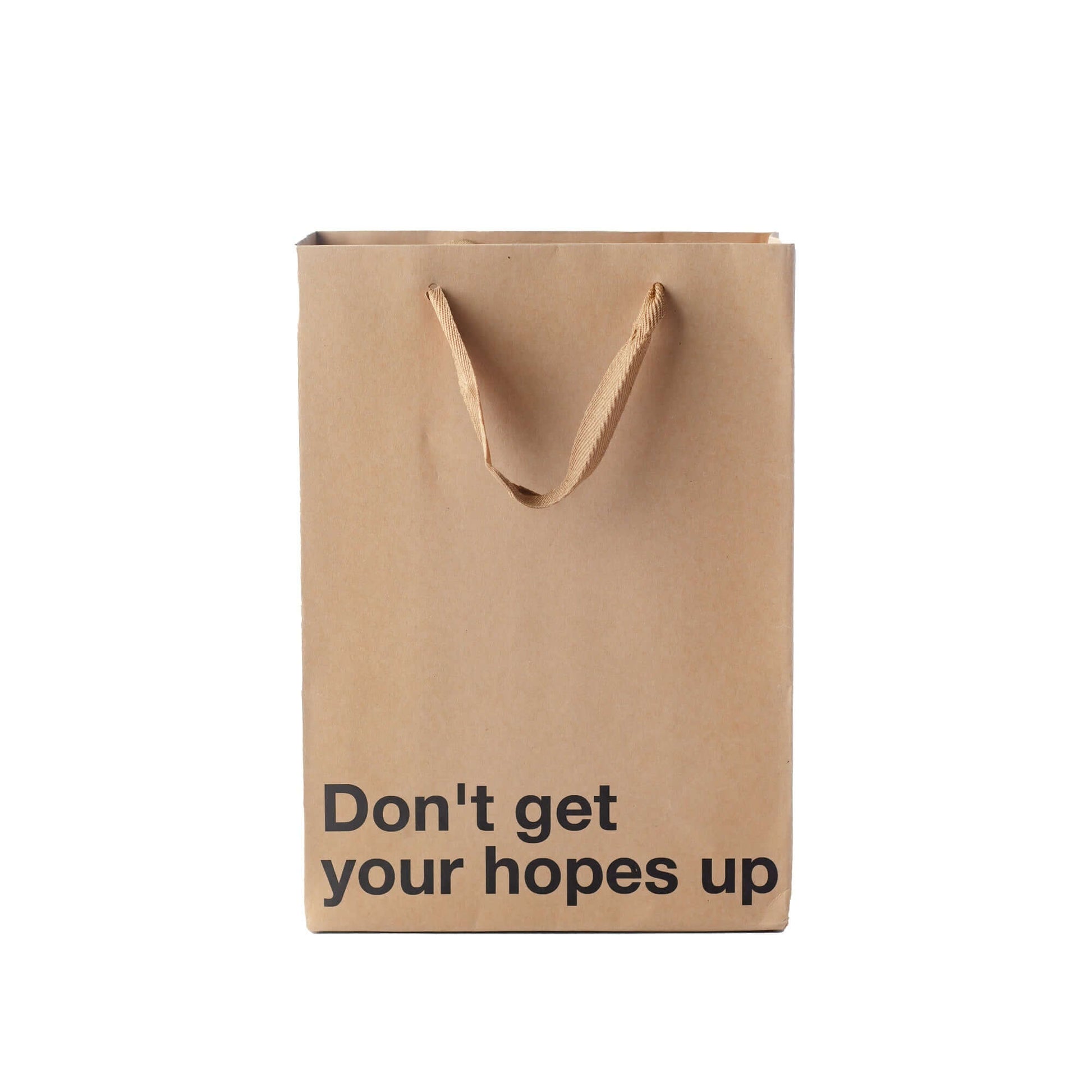 Funny gift bag with the text 'Don't get your hopes up,' made of kraft material with brown ribbon handles.