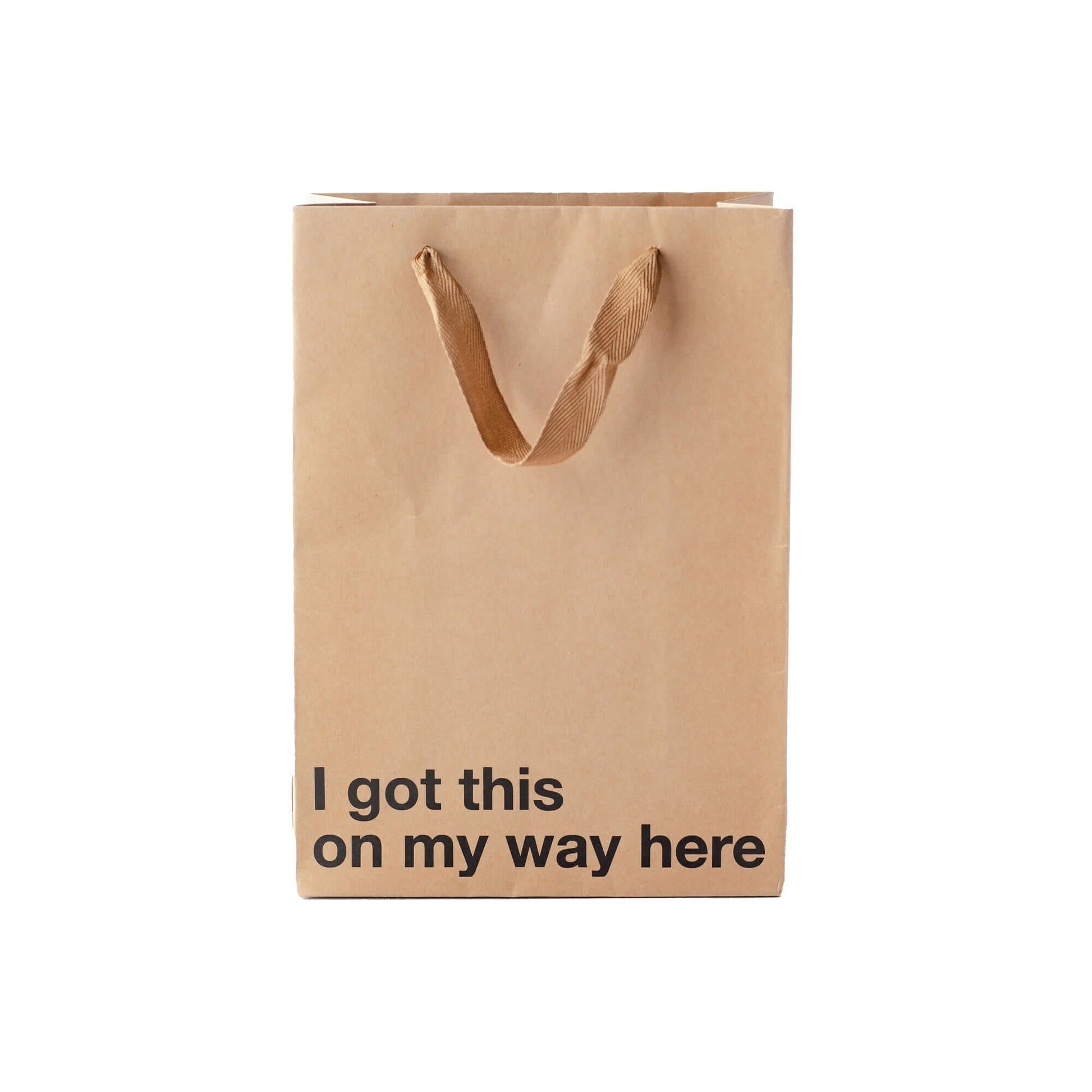 Funny gift bag featuring the phrase 'I got this on my way here', ideal for gift giving without messy wrapping.