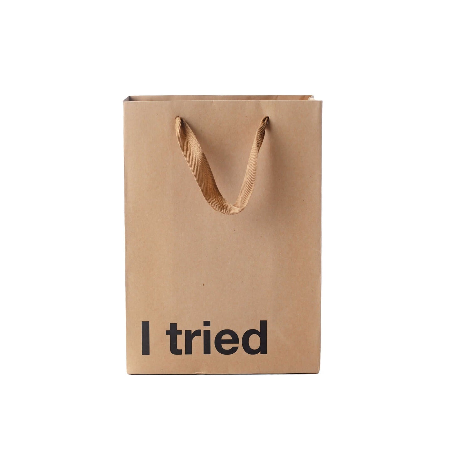 Funny gift bag labeled 'I tried' with a brown ribbon handle, made from kraft material, ideal for unique gifting.