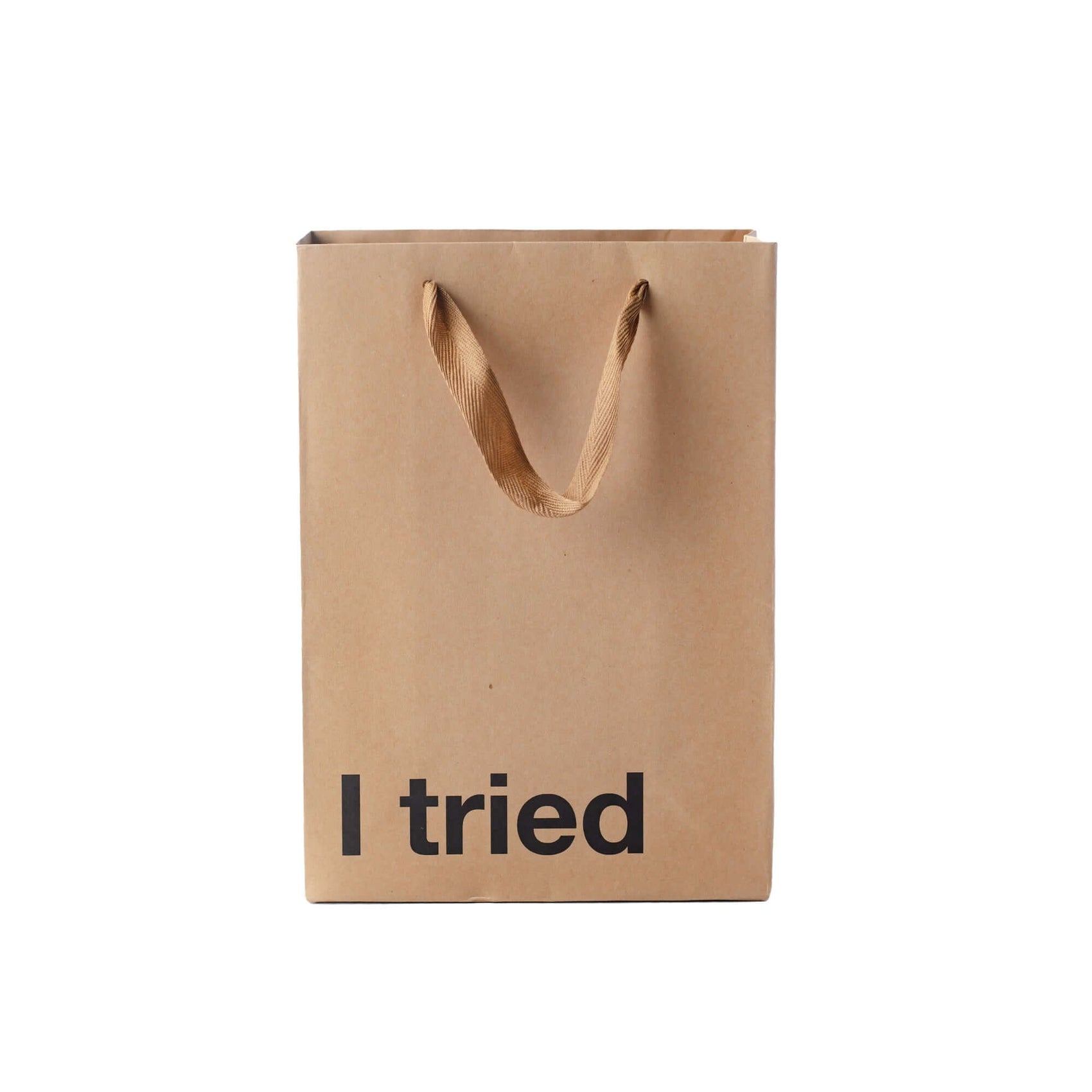 Funny gift bag labeled 'I tried' with a brown ribbon handle, made from kraft material, ideal for unique gifting.