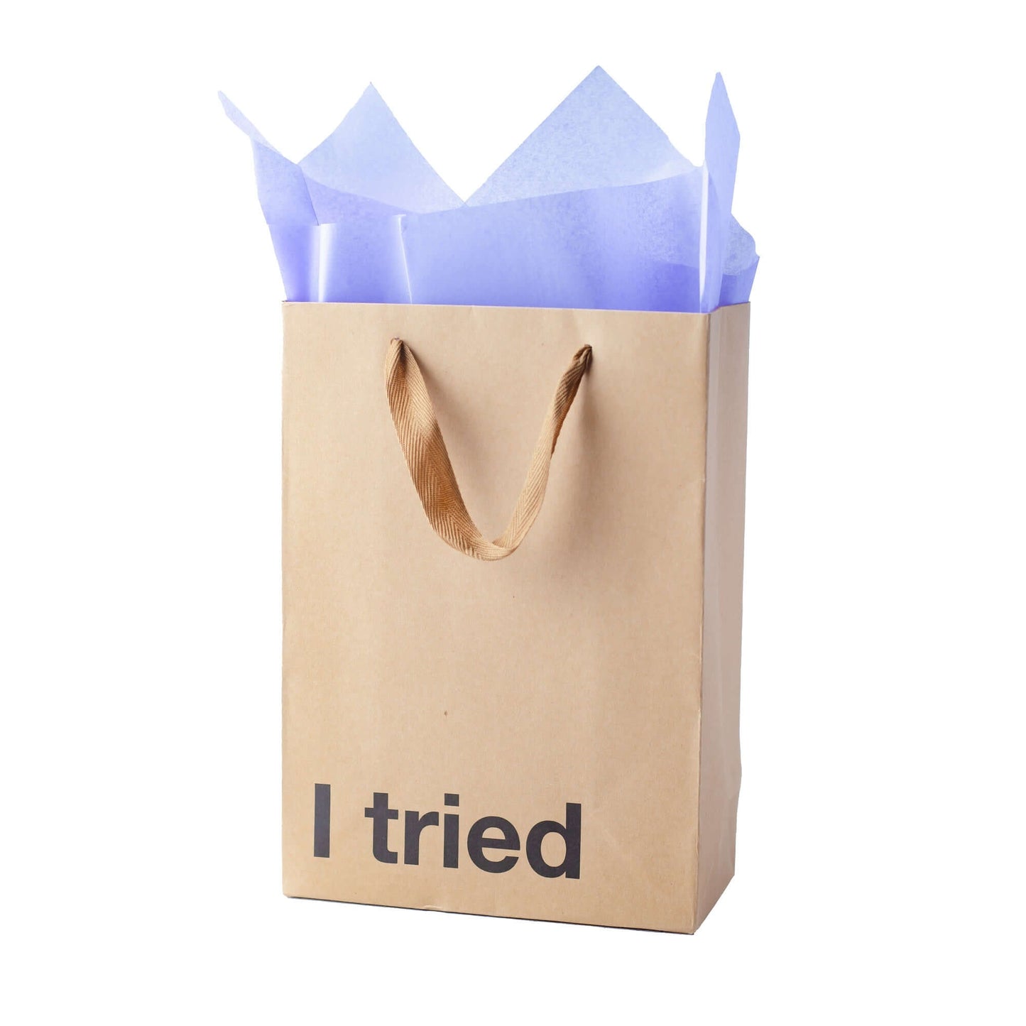 Funny gift bag with 'I tried' text in black on kraft paper, featuring blue tissue paper inside.