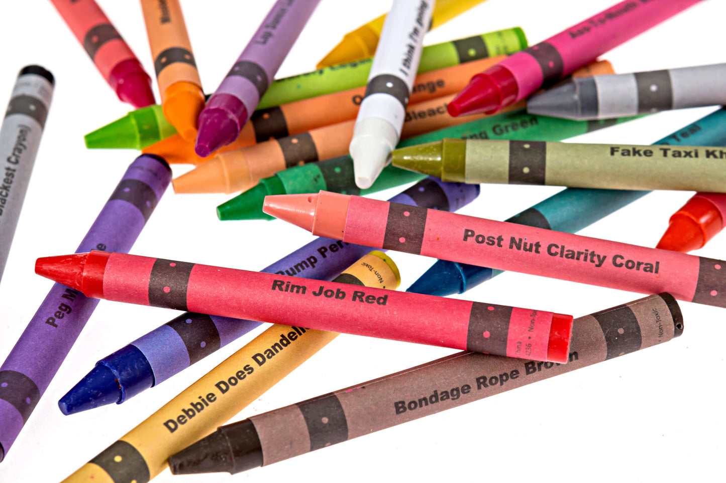 Assorted Offensive Crayons from the Porn Pack featuring humorous names and vibrant colors.