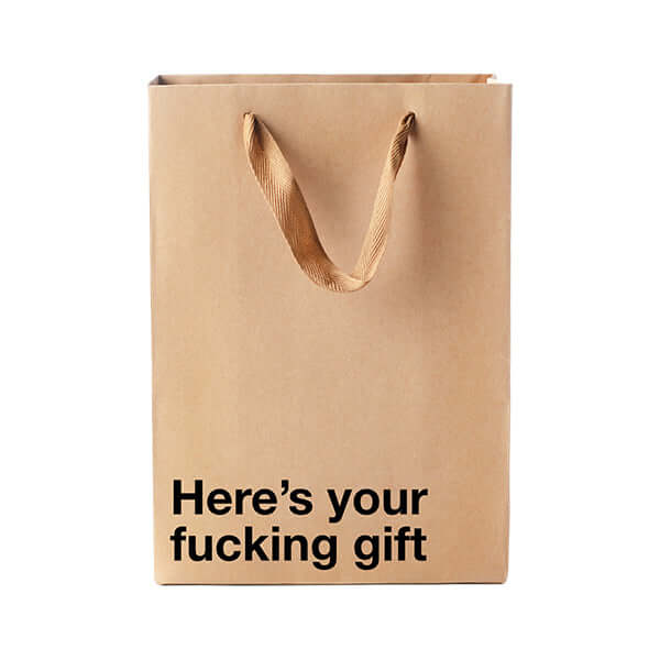 Funny gift bag with bold text saying "Here's your fucking gift" for a humorous and cheeky gifting experience.
