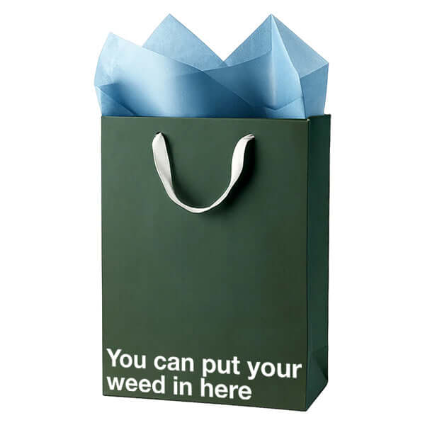 Funny gift bag with a pot-themed joke saying 'You can put your weed in here' for stoner humor.