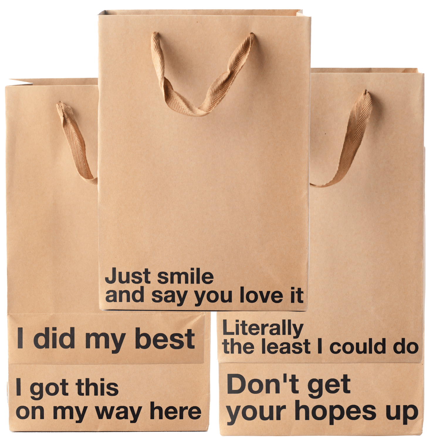 Funny gift bags set featuring humorous phrases for gifting, including 'Just smile and say you love it' and 'Don't get your hopes up'.