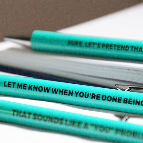 Funny pens in a 3pc Passive Aggressive Pen Set with sarcastic quotes for office humor.