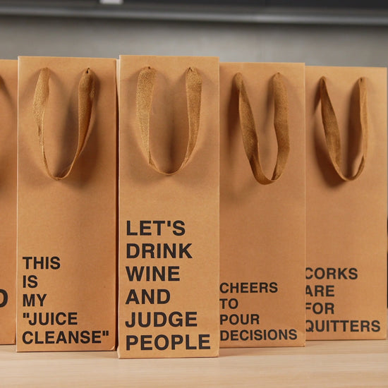 Wine gift bag set of 5 made from kraft paper, perfect for funny wine bags and gifting.