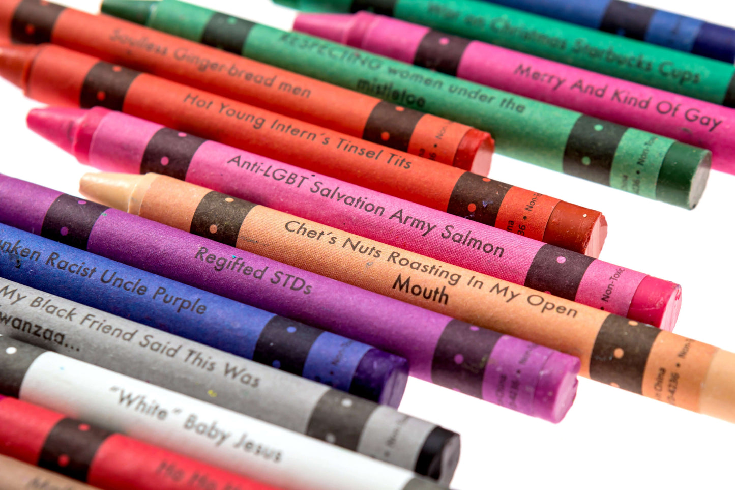 Colorful offensive crayons highlighting comical holiday themes and awkwardness in a creative gift set.