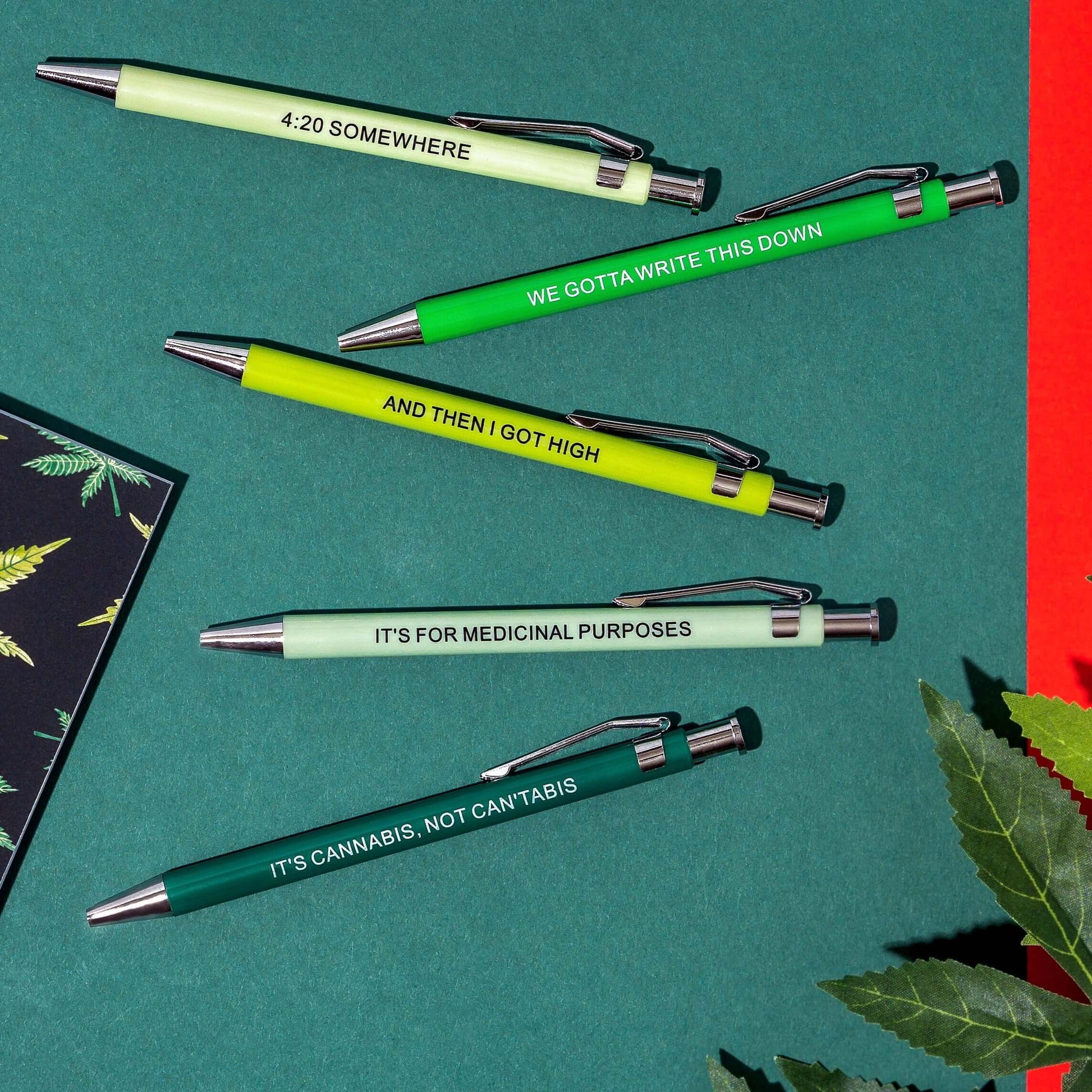 Funny pens with cannabis-themed sayings including "4:20 Somewhere" and "It’s for medicinal purposes".